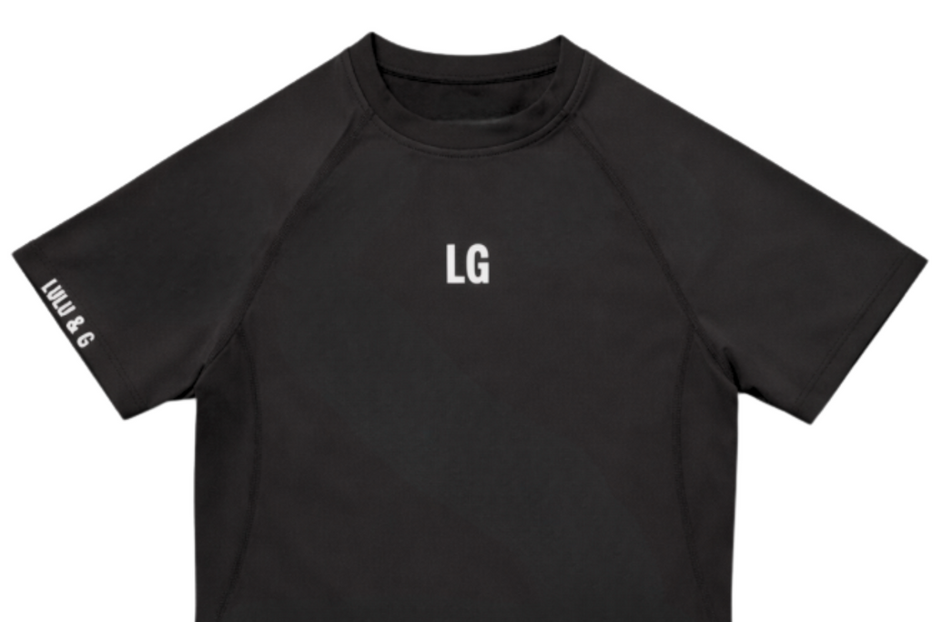 Kids black short sleeve compression shirt.